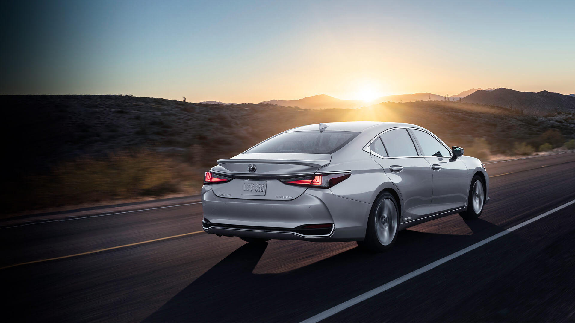 Silver ES being driven on the road.